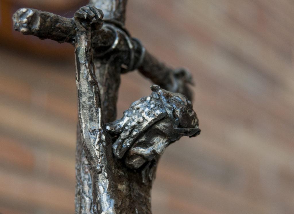 Sculpture of Jesus nailed to the cross.